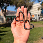Aros corazón Cristales Negros